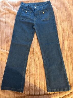 Dark Blue Wide Leg Flare Jeans with cute pocket detail. Size M. Stretch
